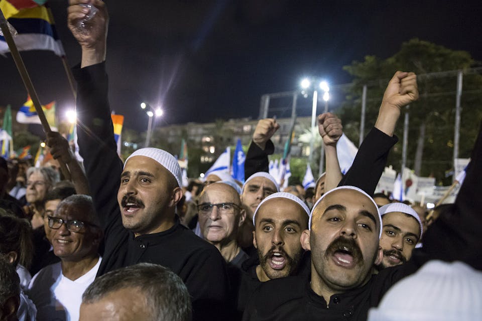 *Israeli Druze men protest against the new nation-state law on August 4, 2018 in Tel Aviv.* Amir Levy/Getty Images. Gur Nation State Main