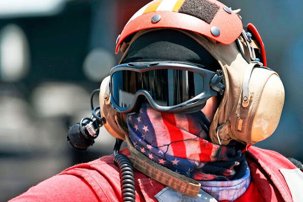 *A serviceman on a U.S aircraft carrier docked in Haifa, Israel on July 3, 2017.* RONEN ZVULUN/AFP/Getty Images. Abrams Freilich
