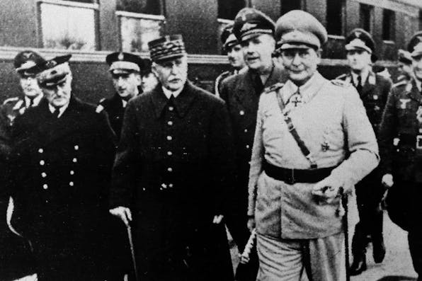 *Admiral Jean-François Darlan, Marshal Phillipe Petain and Air Marshal Hermann Goering after a meeting between Vichy and Nazi leaders at which they discussed the handing over of bases in French North Africa to the Nazis.* Popperfoto/Getty Images. Vichy Main