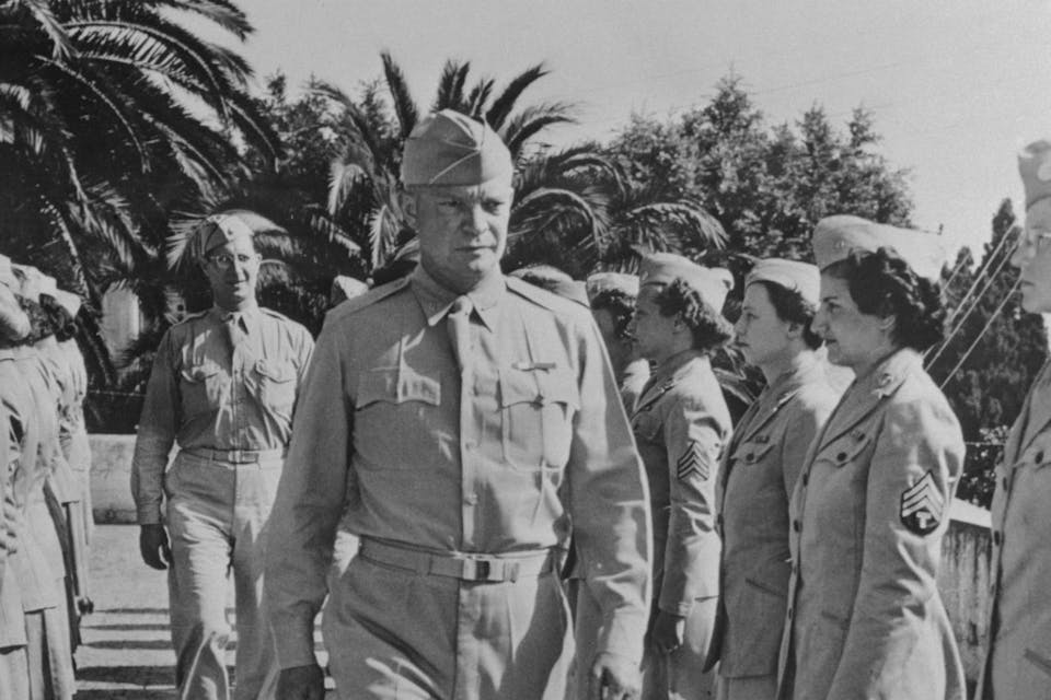 *Members of the Women’s Army Auxiliary Corps on overseas duty in North Africa are reviewed by General Dwight D. Eisenhower in 1943.* Bettmann. Ike North Africa