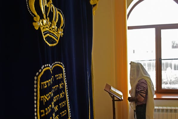 *A man at a synagogue in the Russian city of Pyatigorsk.* Anton PodgaikoTASS via Getty Images. Russia Prayer Main