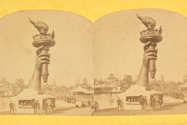 *From a stereoscopic image of the right arm and torch of the Statue of Liberty.* 1876 Centennial Exposition via Wikipedia. Statue-Liberty