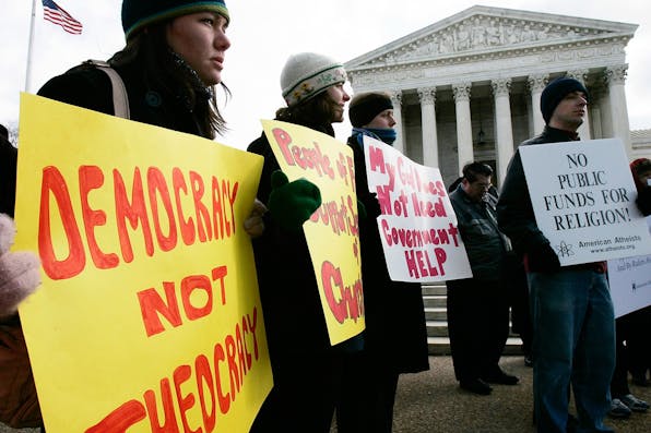 *Activists during a rally in front of the U.S. Supreme Court on March 2, 2005.* Alex Wong/Getty Images. samuelson-last-word