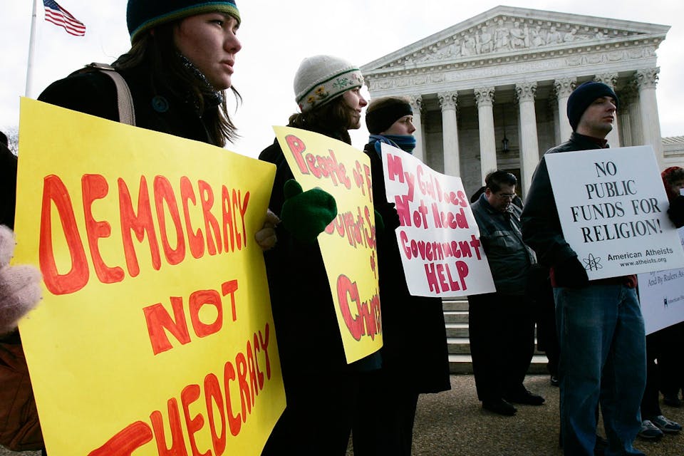 *Activists during a rally in front of the U.S. Supreme Court on March 2, 2005.* Alex Wong/Getty Images. samuelson-last-word