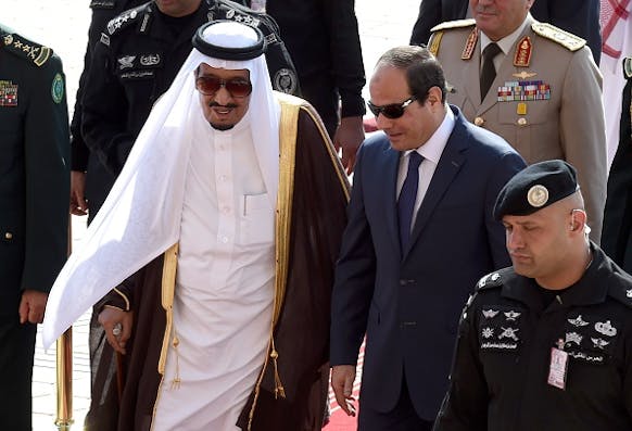 Saudi King Salman bin Abdulaziz (L) welcomes Egyptian President Abdel Fattah al-Sisi at Riyadh international airport on November 10, 2015, as Arab leaders and top officials from South America converged on Saudi Arabia for a summit aiming to strengthen ties between the geographically distant but economically powerful regions. AFP PHOTO / FAYEZ NURELDINE        (Photo credit should read FAYEZ NURELDINE/AFP/Getty Images)