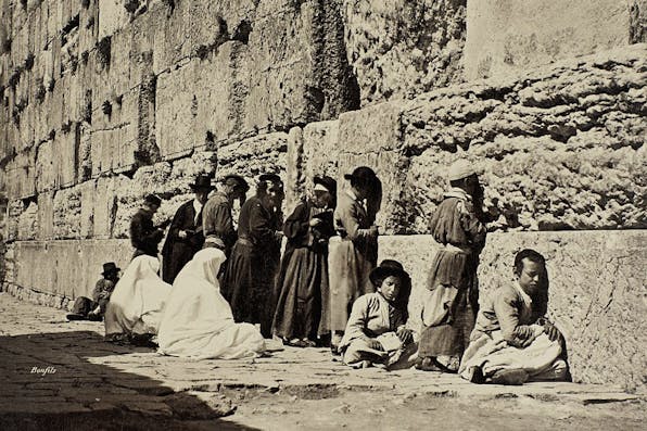 *Jews praying at the Western Wall in the 19th century.* Halkin-LW