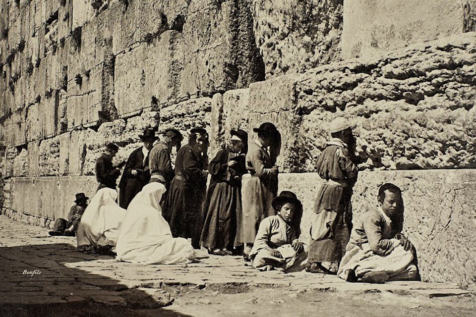 *Jews praying at the Western Wall in the 19th century.* Halkin-LW