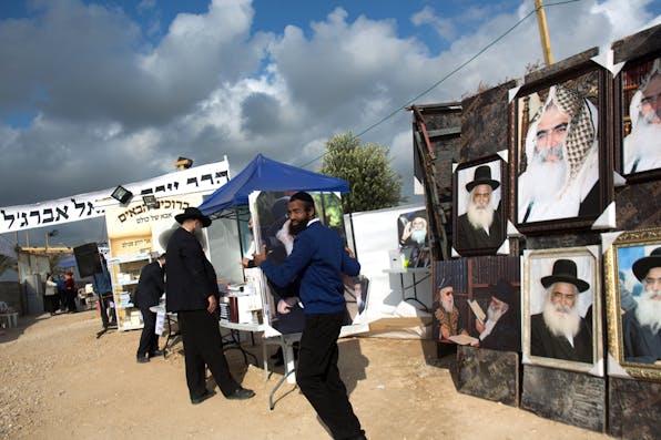 *Moroccan Jewish men at the tomb of Rabbi Israel Abuhaṣeira, known as the Baba Sali, during the annual pilgrimage to his grave in the southern Israeli town of Netivot, on January 14, 2016.* MENAHEM KAHANA/AFP/Getty Images. Mizrahi-Israel