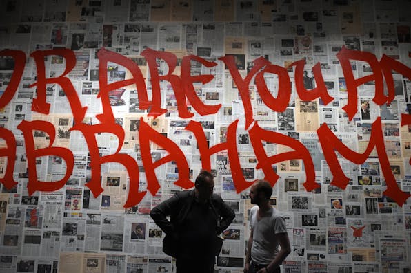*Visitors to the exhibition Obedience: An Art Installation in 15 Rooms by multimedia artist Saskia Boddeke & British film director Peter Greenaway at the Jewish Museum in Berlin.* TOBIAS SCHWARZ/AFP/Getty Images. Appelbaum-Main