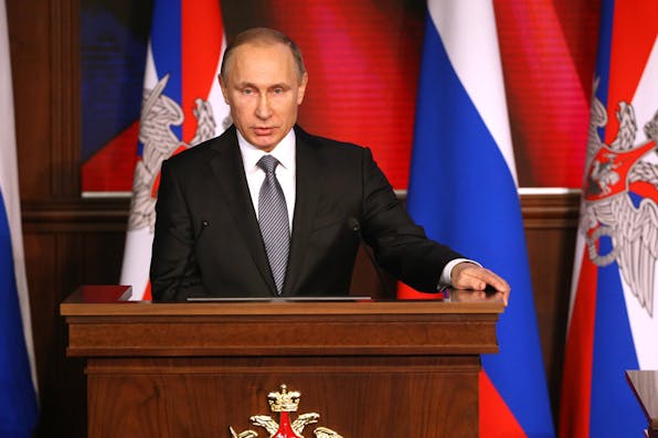 *Russian President Vladimir Putin attends an annual meeting with high ranking officers of the Defence Ministry Board on December 11, 2015 in Moscow, Russia.* Sasha Mordovets/Getty Images. Puting-Main