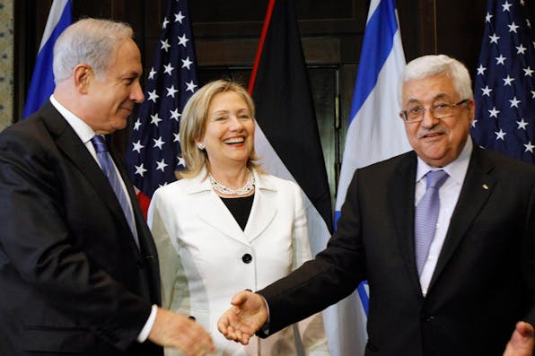 *Benjamin Netanyahu, Hillary Clinton, and Mahmoud Abbas in Egypt in 2010*. AP Photo/Alex Brandon, Pool. EA-Main