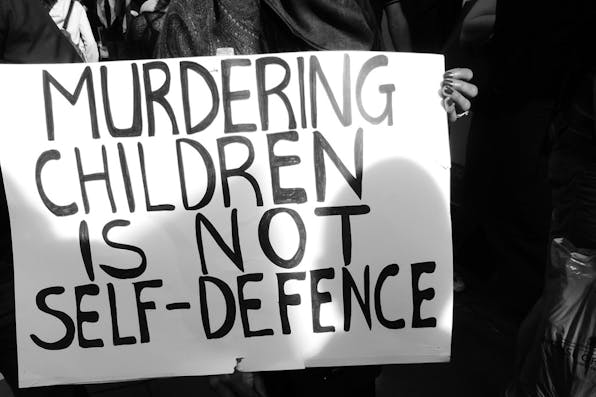 *A sign at an anti-Israel protest in 2014.* DuncanC/Flickr. Cohen-Main
