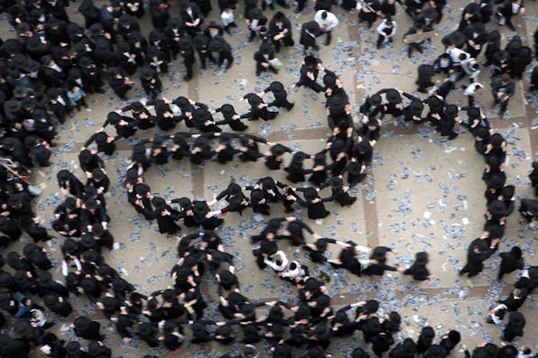 Haredi *Jews at a demonstration in Jerusalem on March 2, 2014.* Photo by Menahem Kahana/AFP/Getty Images. Pfeffer-Main