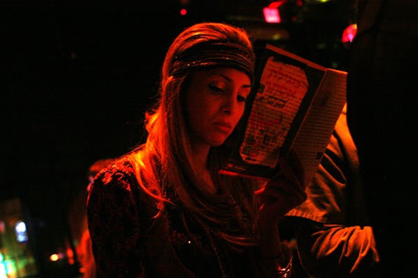*A woman at a Purim party at a club in New York.* Kitra Cahana/Getty Images. Difference-Main