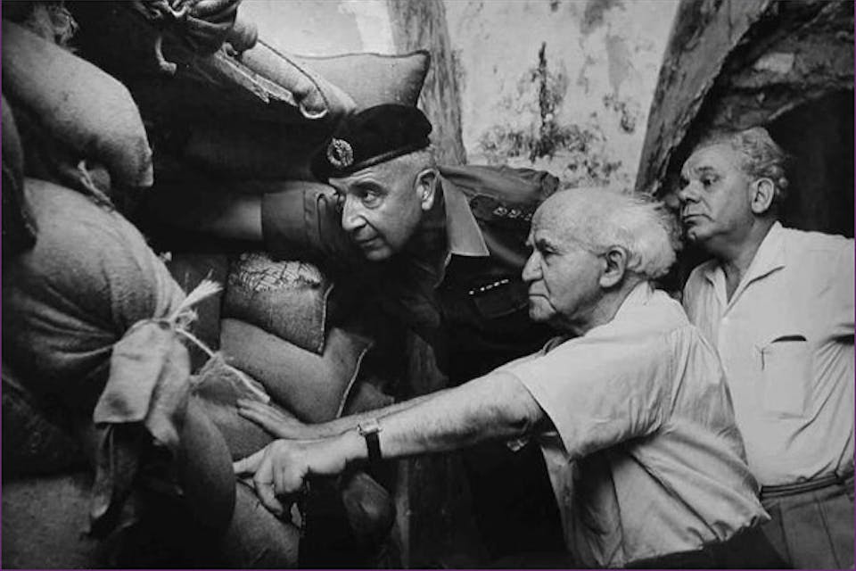 *David Ben-Gurion with IDF Commander Yossef Nevo and Mayor of Jerusalem Mordechai Ish-Shalom at an army post at the Jerusalem border, 1962.* By David Harris. bengurion