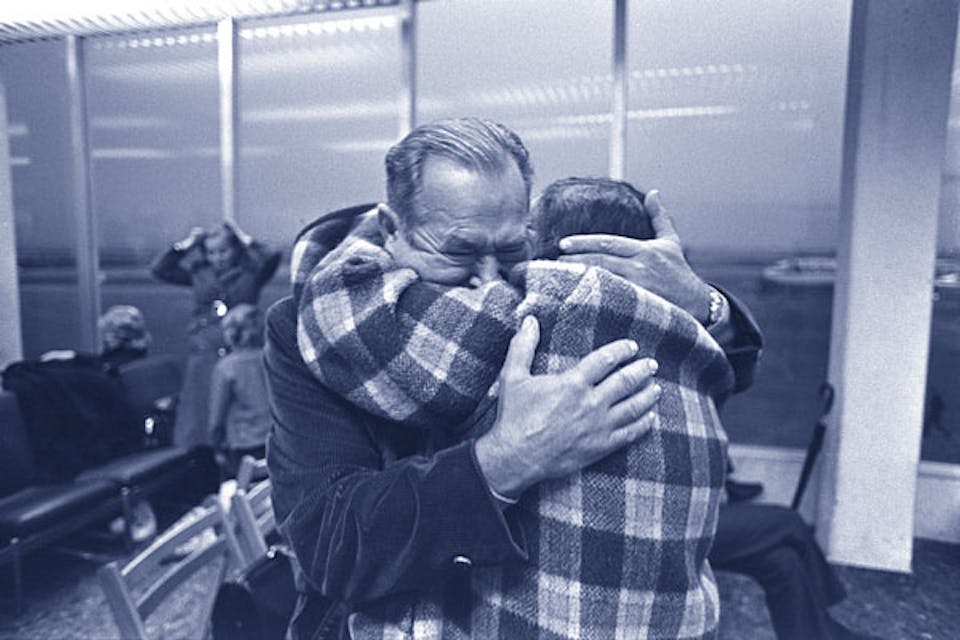 *A Jewish woman, just arrived from Russia, sees her brother for the first time in twenty years at Lod Airport, November 15, 1972.* Moshe Milner/Government Press Office (Israel). reunionblue27