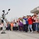 YANTAI, CHINA – MARCH 24, 2025 – A UNITREE G1 humanoid robot waves to children at the Second Experimental Kindergarten in Yantai High-tech Zone, East China’s Shandong province on March 24, 2025. (Photo credit should read CFOTO/Future Publishing via Getty Images)