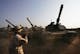 FALLUJA, IRAQ – NOVEMBER 4:  U.S. Army tanks are moved into a base, on November 4, 2004 on the outskirts of Falluja, Iraq. Several thousand U.S. troops are poised for a massive strike near the restive Suni and insurgent stronghold of Fallujah, and Iraqi President Allawi has warned that negotiations with local insurgents to reach a peaceful solution have nearly run their course.  (Photo by Scott Nelson/Getty Images)