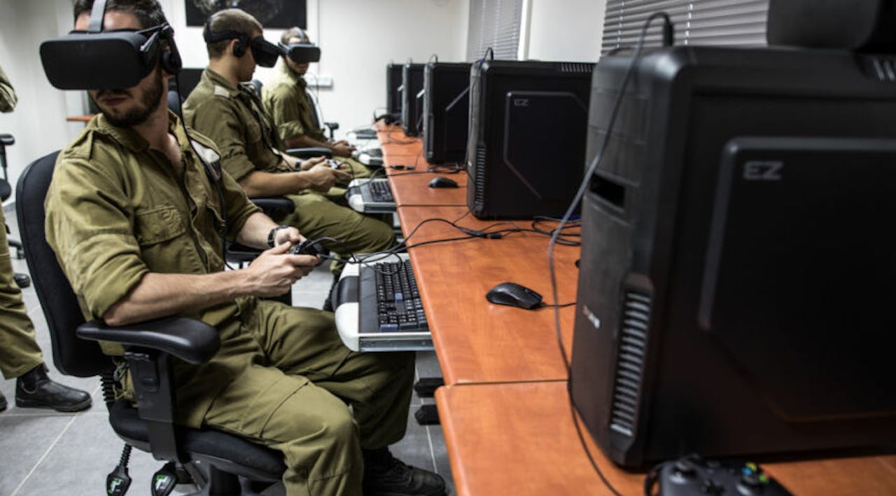 Israeli special combat soldiers conduct a training exercise using virtual reality. *Rina Castelnuovo/Bloomberg via Getty Images.* Israeli special combat soldiers conduct a training exercise using virtual reality (VR) battlefield technology to simulate Hamas tunnels leading from Gaza to Israel at an Israeli Army base in Petach Tikva, Israel, on Wednesday, April 26, 2017. In a refurbished building on a military base in central Israel, soldiers are training in underground combat using headsets made by Oculus, the virtual reality headset maker owned by Facebook Inc., and Vive, owned byHTC Corp. Photographer: Rina Castelnuovo/Bloomberg via Getty Images