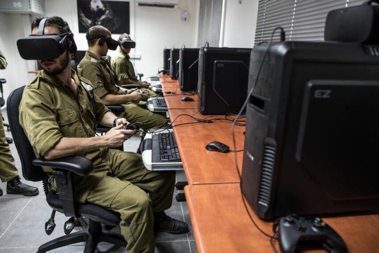 Israeli special combat soldiers conduct a training exercise using virtual reality (VR) battlefield technology to simulate Hamas tunnels leading from Gaza to Israel at an Israeli Army base in Petach Tikva, Israel, on Wednesday, April 26, 2017. In a refurbished building on a military base in central Israel, soldiers are training in underground combat using headsets made by Oculus, the virtual reality headset maker owned by Facebook Inc., and Vive, owned byHTC Corp. Photographer: Rina Castelnuovo/Bloomberg via Getty Images