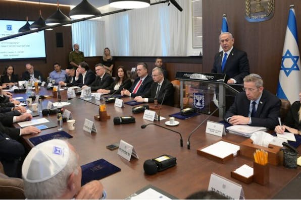 Prime Minister Benjamin Netanyahu addresses a cabinet meeting on October 7, 2024. *Amos Ben Gershom/Israel Government Press Office.* GPOABG_9593