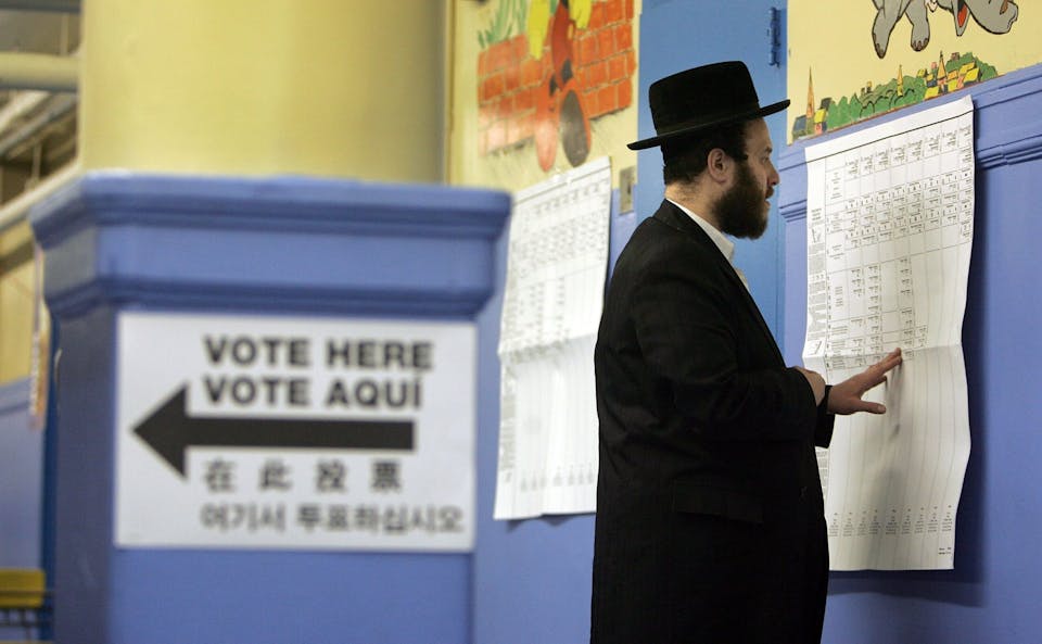 NEW YORK – NOVEMBER 07:  A Hasidic Jewish man prepares to vote November 7, 2006 in the Brooklyn borough of New York City. Mid-term elections take place across the U.S. today with the balance of power in Congress at stake.  (Photo by Mario Tama/Getty Images)