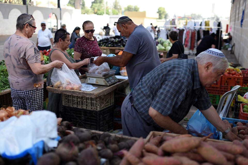 SDEROT, ISRAEL – July 15, 2018: (ISRAEL OUT) Israelis at the local market in the Southern city of Sderot, located near the Israel-Gaze border as a cease-fire holds after day of intense Israel-Hamas fighting.   (Photo by Gili Yaari/NurPhoto via Getty Images)