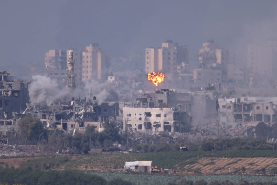 Smoke rises from an explosion in Gaza on October 28, 2023 seen from Sderot, Israel. *Dan Kitwood/Getty Images.* GettyImages-1749127076