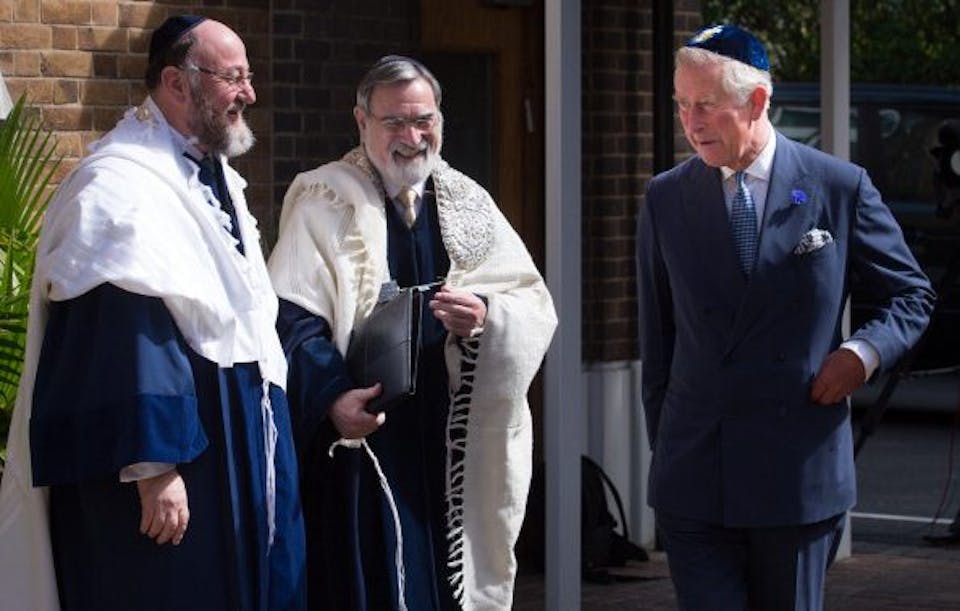 Prince Charles (R) meets Lord Jonathan Sacks (C) and his successor Chief Rabbi Ephraim Mirvis (L) before Mirvis was formally inducted as 11th Chief Rabbi of the UK. (Stefan Rousseau/AFP/Getty Images)