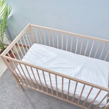 Baby,Bed,Top,View.,A,Bright,Room,With,A,Green