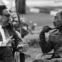640px-Henry_Kissinger_with_Anwar_Sadat_cph.3b13868