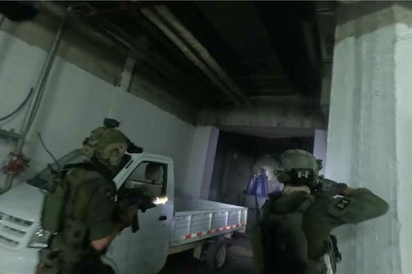 Israeli soldiers in the Syrian missile facility during the raid, September 2024. *IDF Spokesperson's Office via Wikimedia.* Operation_many_ways_September_2024_(20)