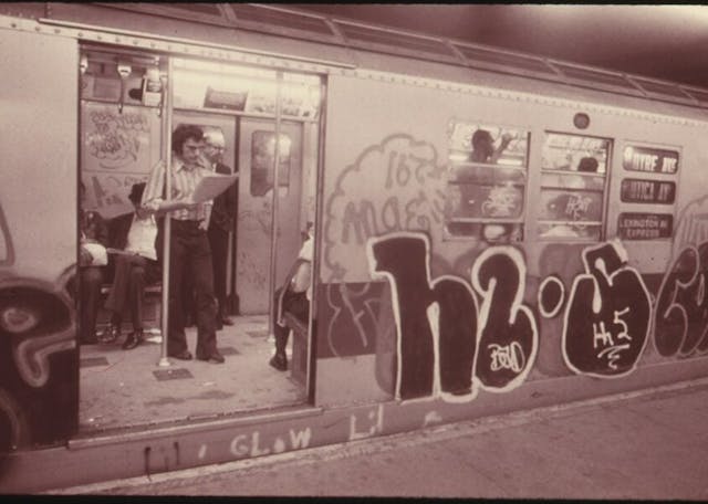 1071px-GRAFFITI_ON_A_SUBWAY_CAR_ON_THE_LEXINGTON_AVENUE_LINE_IN_NEW_YORK_CITY._IN_1973_TRANSIT_AUTHORITY_POLICE_ARRESTED._-_NARA_-_556811-e1741325470786