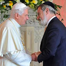 Pope Benedict XVI meets Britain’s Chief Rabbi Jonathan Sacks at a meeting of religious leaders at St Mary’s University College Chapel at Twickenham in west London