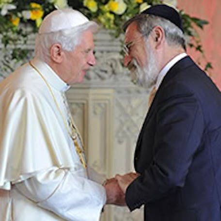 Pope Benedict XVI meets Britain’s Chief Rabbi Jonathan Sacks at a meeting of religious leaders at St Mary’s University College Chapel at Twickenham in west London