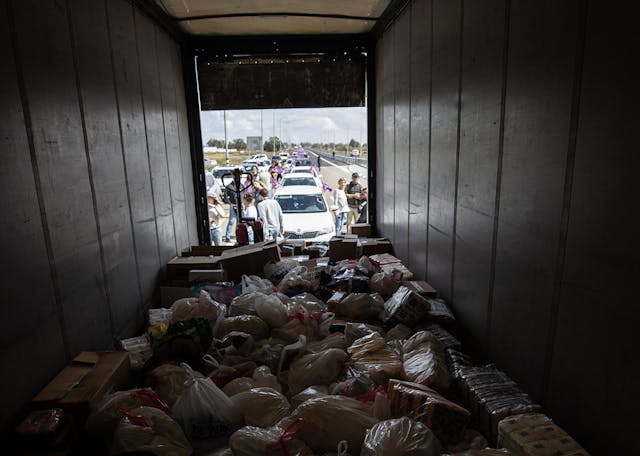 A truck delivering aid to the Gaza Strip on March 07, 2024. Mostafa Alkharouf/Anadolu via Getty Images. 2024_03_08 Jonathan Conricus on How Israeli Aid to Gaza Works – Featured Image