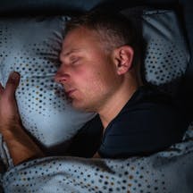 Man,Sleeps,Happily,And,Contentedly,On,His,Side,In,A