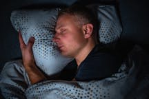 Man,Sleeps,Happily,And,Contentedly,On,His,Side,In,A