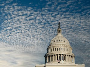 The Capital Rotunda against a blue sky
