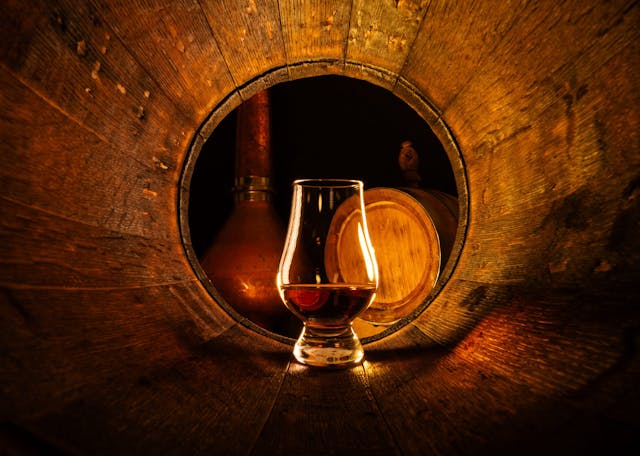A,Glass,Of,Scotch,Whiskey,In,Old,Oak,Barrel.,Copper