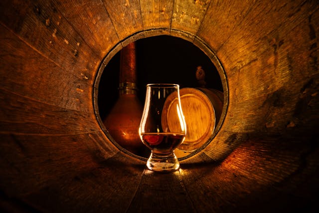 A,Glass,Of,Scotch,Whiskey,In,Old,Oak,Barrel.,Copper