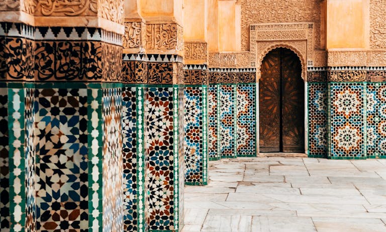 Colorful ornamental tiles at a Moroccan courtyard. *Shutterstock*. tiles