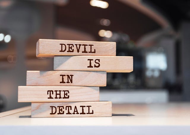 Wooden,Blocks,With,Words,’devil,Is,In,The,Detail’.