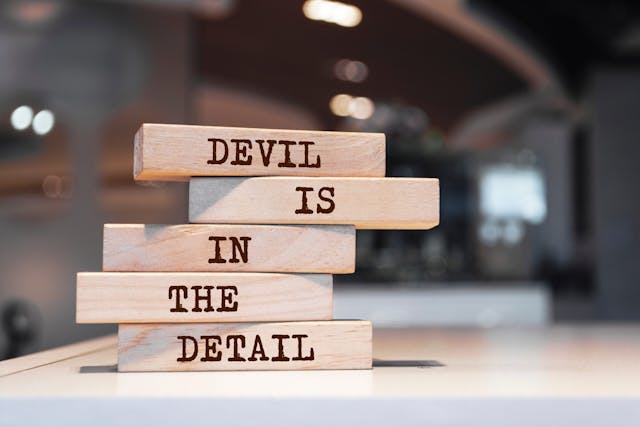 Wooden,Blocks,With,Words,’devil,Is,In,The,Detail’.