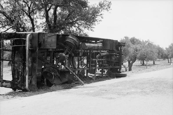 A Jewish passenger bus burned by Arabs, 1930s. (Library of Congress.) Burnt bus 1929 wikimedia