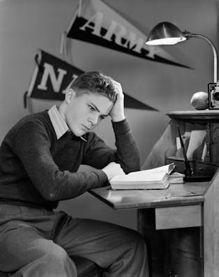 Young man studying, 1940s (H. Armstrong Roberts/ClassicStock via Getty Images)