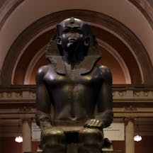 Colossal Seated Statue of a Pharaoh in the Great Hall of the Metropolitan Museum of Art (ELEPHOTOS / Shutterstock) Colossal Seated Statue of a Pharaoh in the Great Hall of the Metropolitan Museum of Art (ELEPHOTOS / Shutterstock)