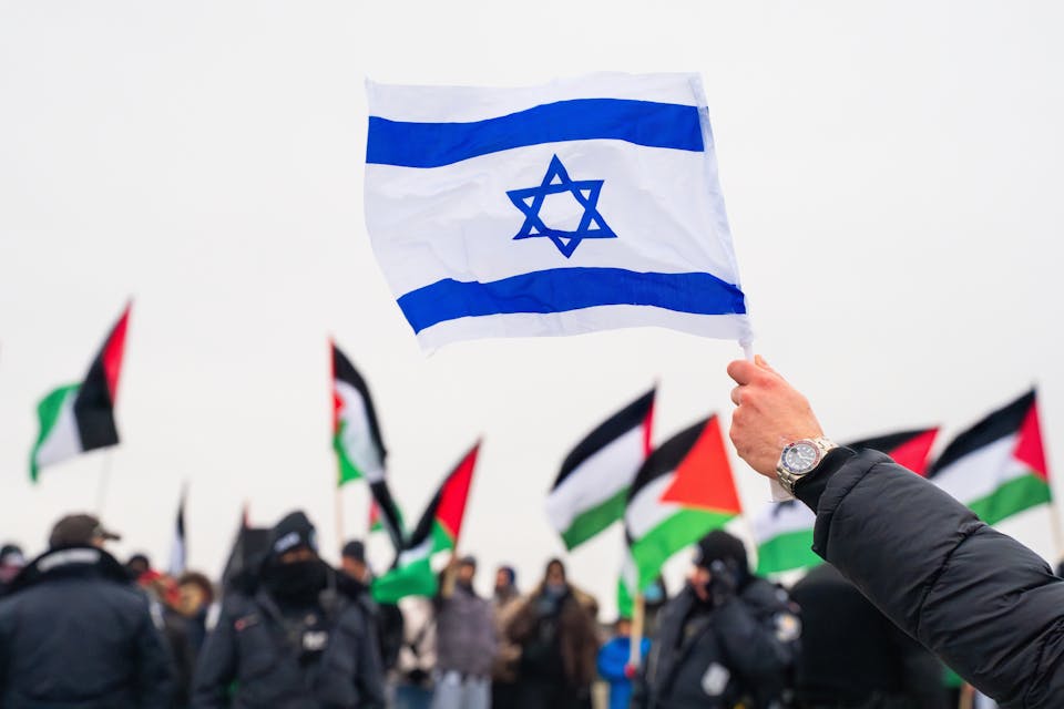 Israel Flag Amid Palestinian Flags