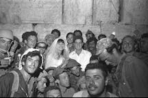 Paratroopers celebrating his wedding in front of the Western Wall (Aharon Tzukerman, Wikimedia Commons)