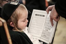 Boy learning Hebrew alphabet